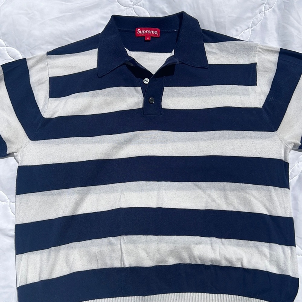 Supreme knit polo blue and white stripe.